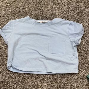 This light blue shirt is in great quality and not see through.